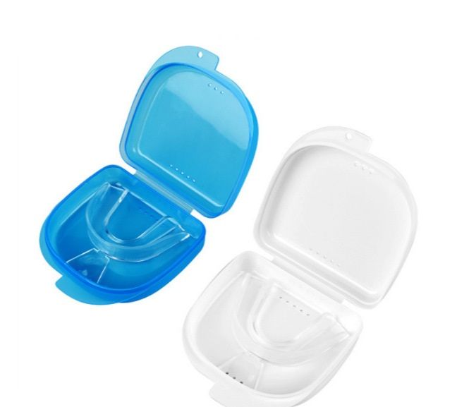 A blue and a clear vented case, each with an EVA tray, and loose trays.
