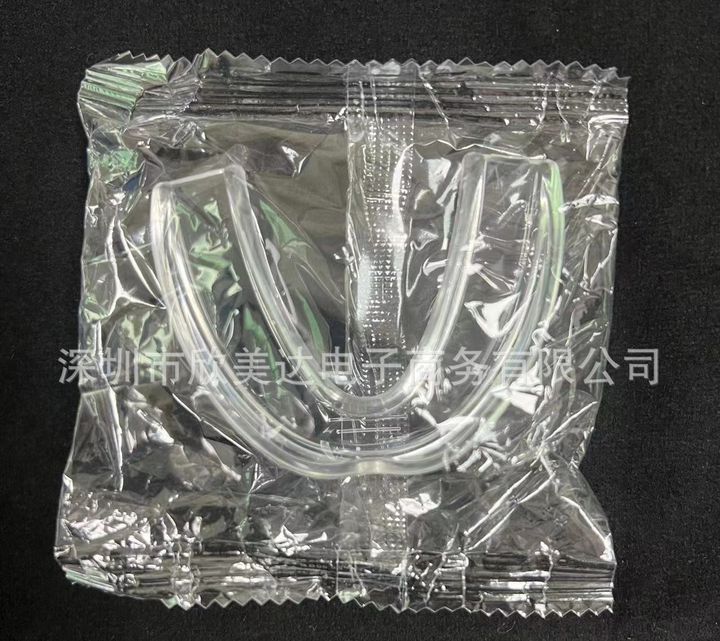Clear boil-and-bite night guard sealed in its pouch.