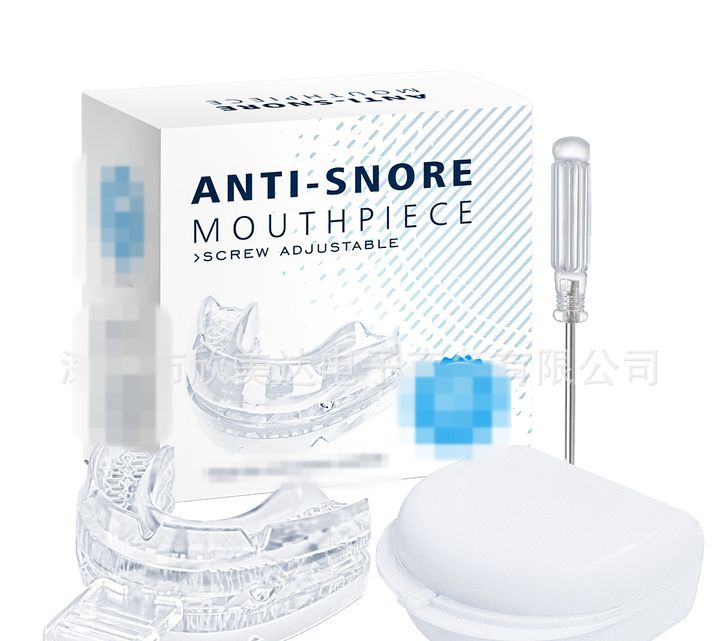Clear screw-adjustable mouthpiece with its fitting tool and case, box behind.