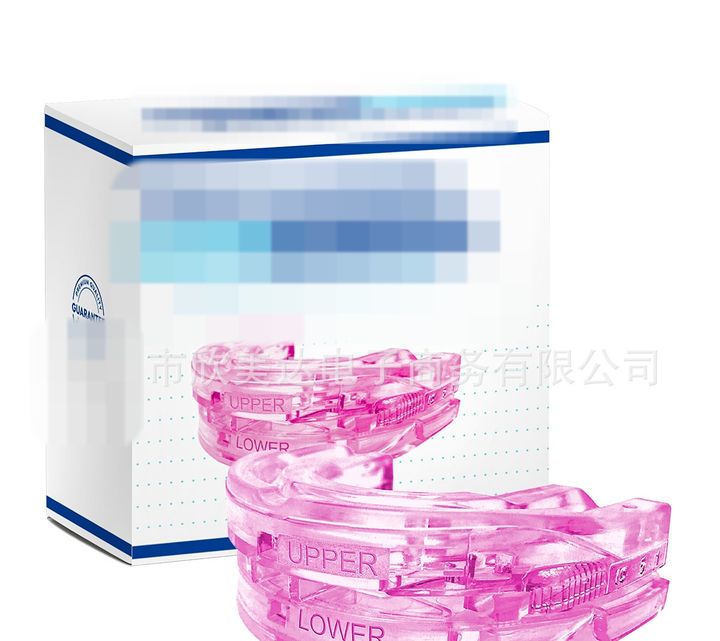 Pink adjustable mouthpiece with the retail box behind.