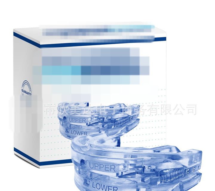 Blue adjustable mouthpiece with the retail box behind.