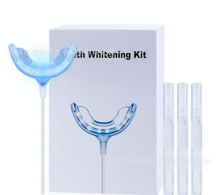 Whitening kit with its box, LED tray and three pens.